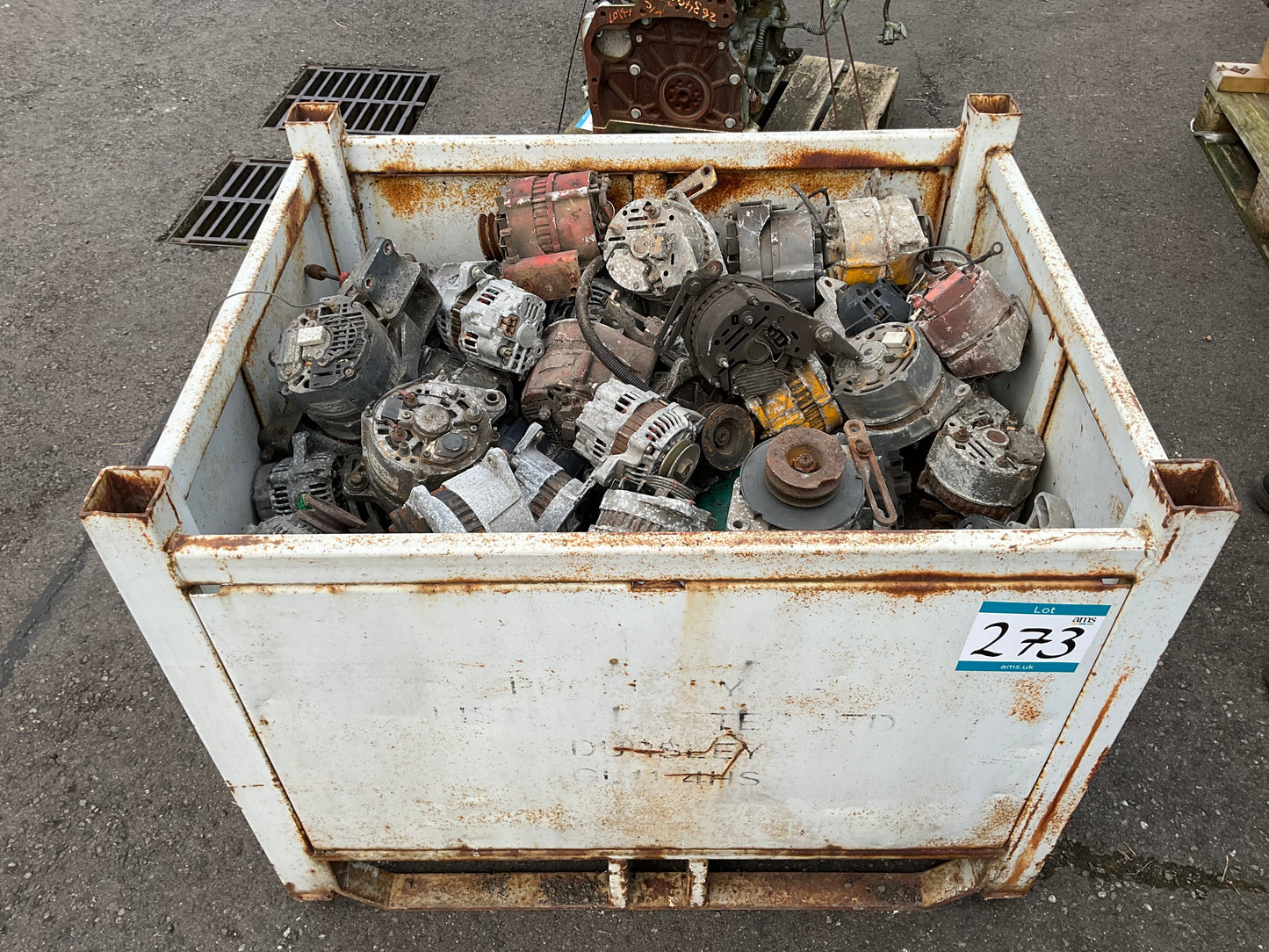 Crate of Used Charging Alternators