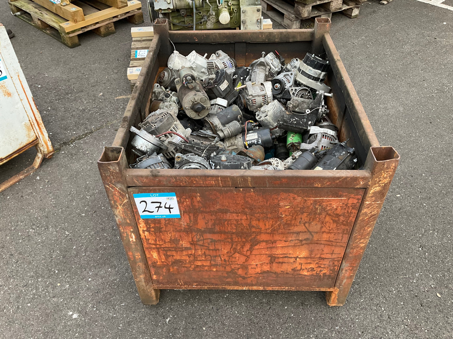 Crate of Used Charging Alternators